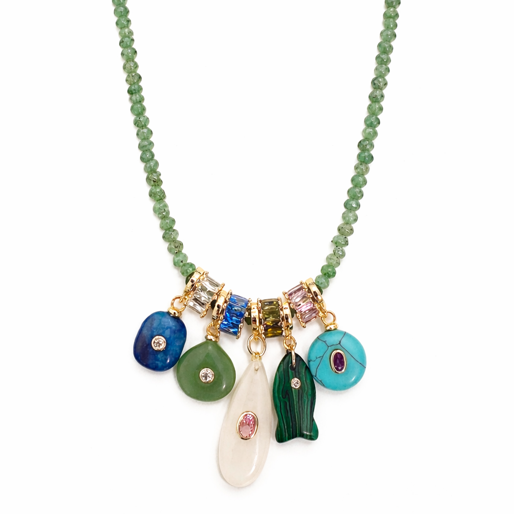 Necklace with colorful charms on a white background